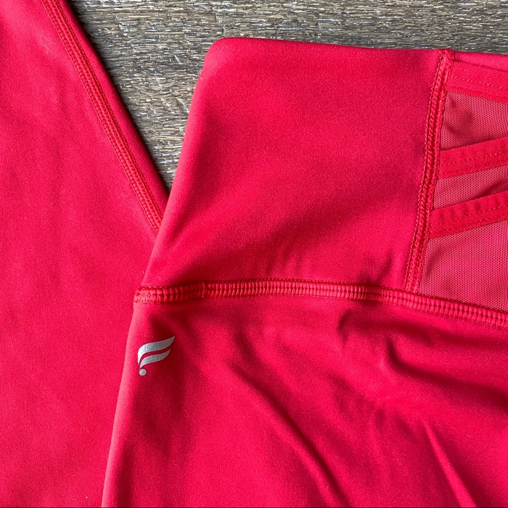 Fabletics Trinity Motion 365 Capri Leggings in red